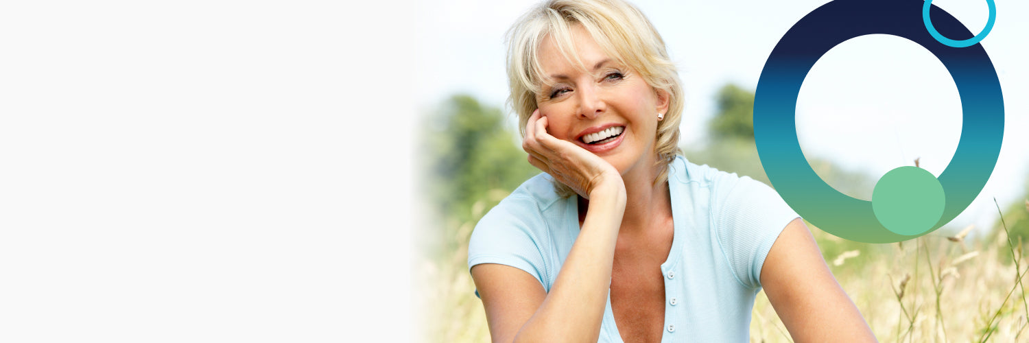 Older female in meadow. Ombre circles to right of image.